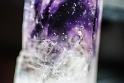 Quartz with amethyst inclusion